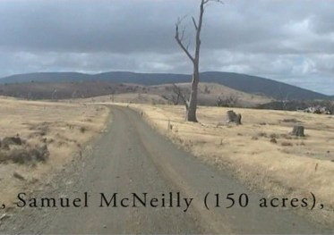 2009 driving black home still EXHI010386_nb